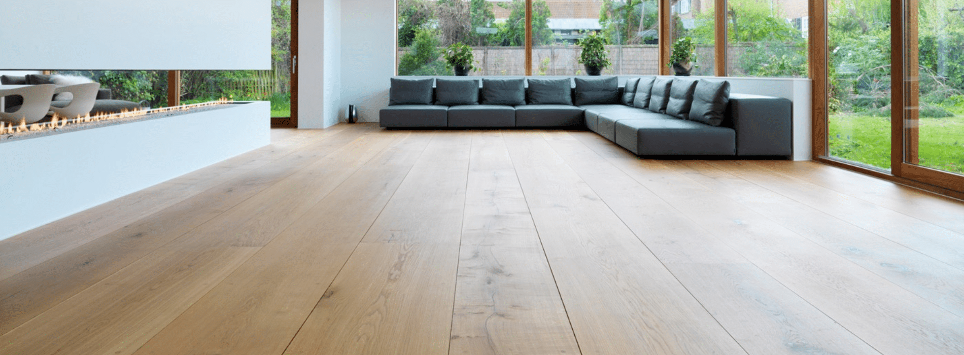 Revitalized engineered oak floors in Crofton Park, SE4 by Mr Sander®. Mid-oak stain and Junckers strong satin finish highlight rich wood grains. Displaying timeless elegance and durability, these restored floors promise long-lasting beauty in every detail.