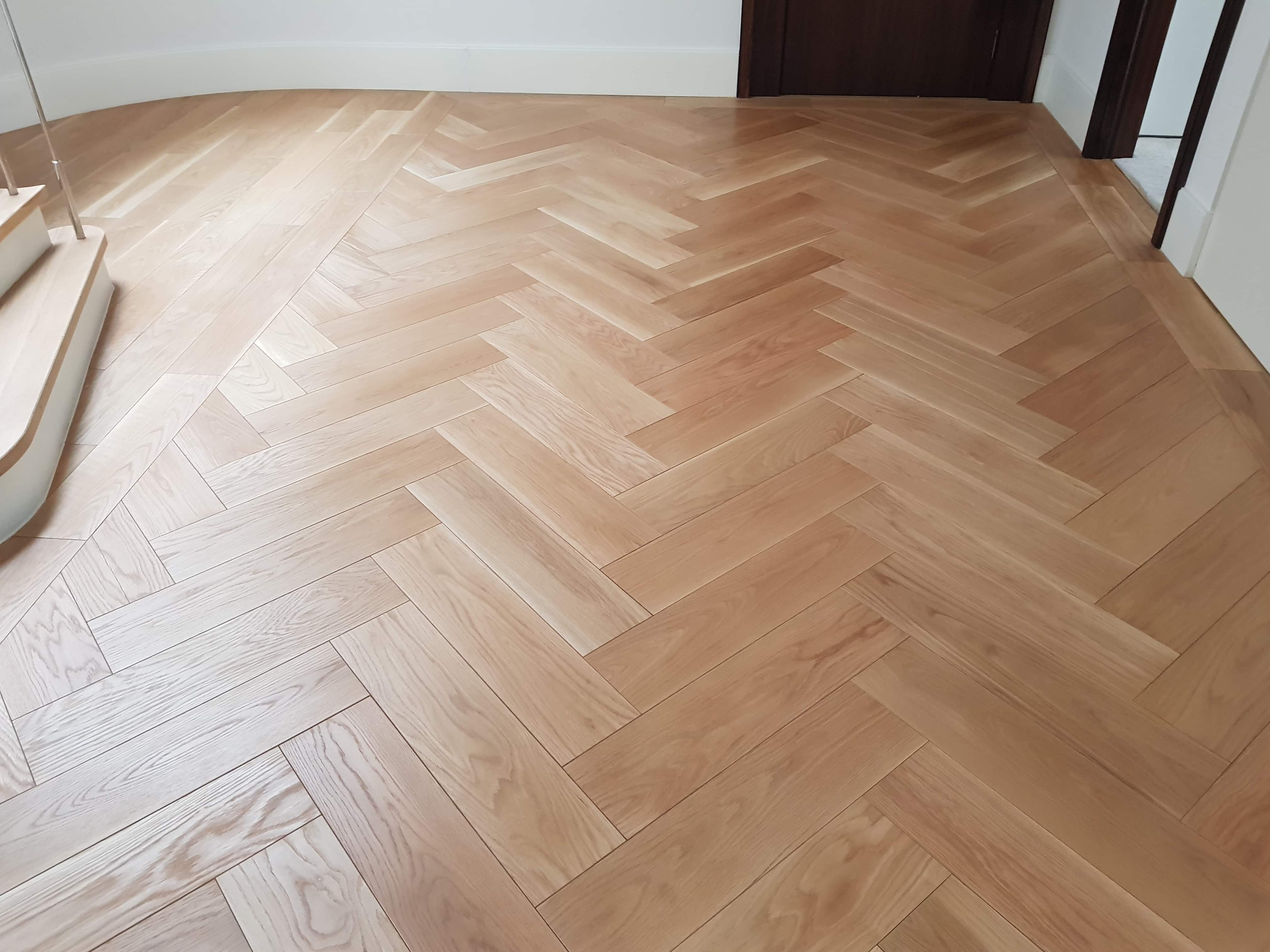 Parquet, sanded, gap filled with resin and sealed with 4 coats of matt natural seal.