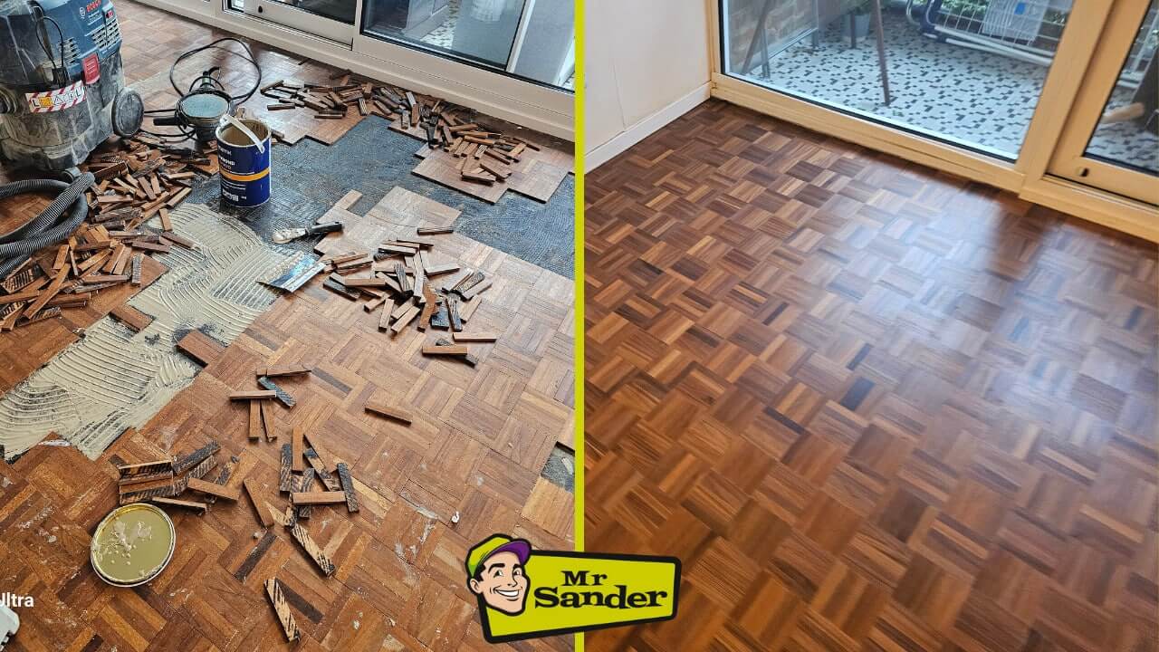 A before and after comparison of a 5-finger parquet wood floor in the process of repair and restoration. The left side shows the floor undergoing repair, with parquet pieces lifted and scattered, and tools and adhesive cans present. The right side displays the floor after sanding and refinishing, with a polished and glossy finish, highlighting the intricate square pattern of the parquet. Sunlight coming through the glass doors emphasizes the restored, smooth surface. The Mr. Sander® logo is placed at the bottom center.