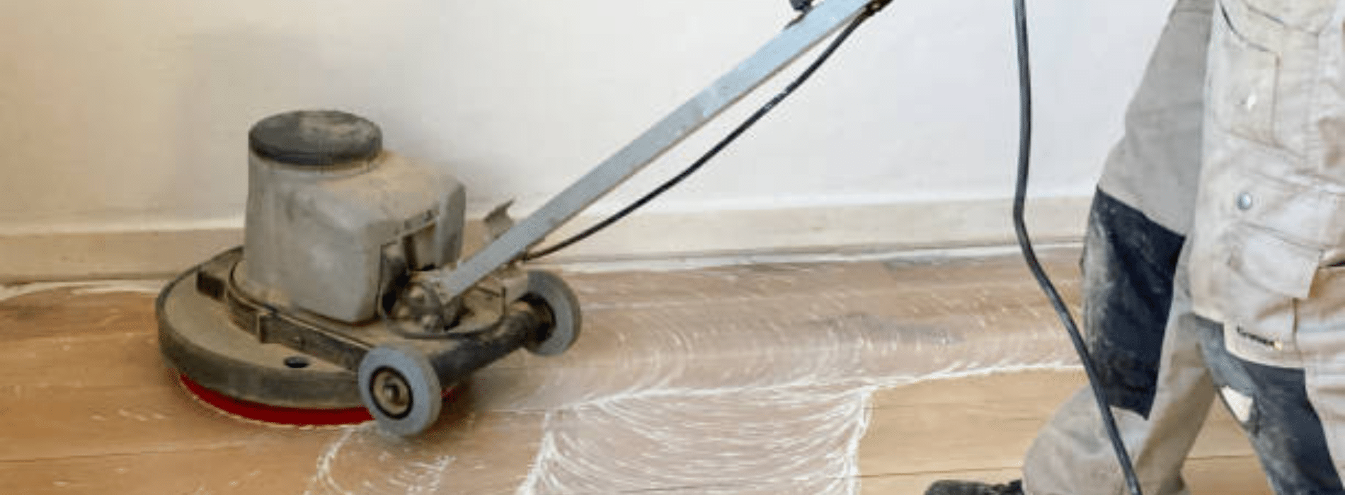 Mr Sander® skillfully sanding a herringbone floor with a Effect 2200, Voltage 220, Frequency 60 Bona belt sander. Experience their expertise and attention to detail in achieving outstanding results.