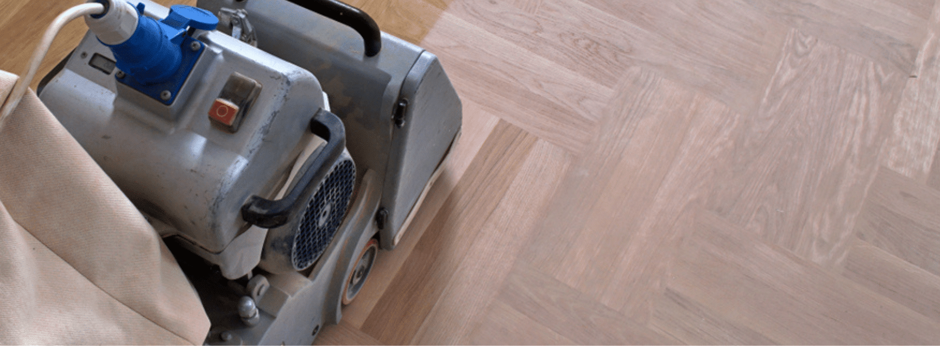 Mr Sander® in Gipsy Hill, SE19, expertly restoring herringbone flooring with Bona belt sander; HEPA-filter ensures dust-free environment, capturing the machine's precision and high-quality results.