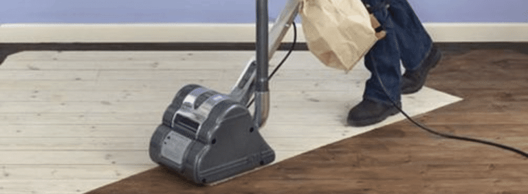 Professional herringbone floor sanding with Bona belt sander and HEPA-filtered dust extraction system. Experience efficient and clean sanding with our experts. Size: 200x750 mm. Voltage: 230V. Frequency: 50Hz. Mr Sander® - Transforming your floors with precision and quality.