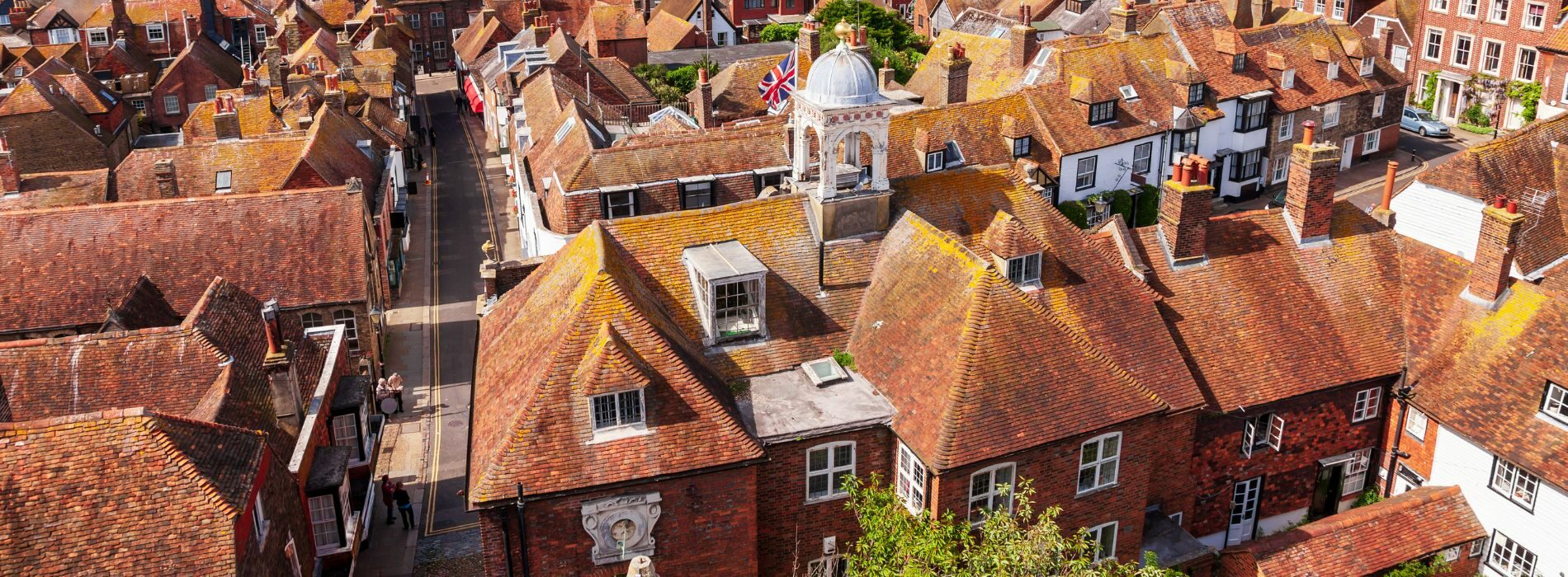 Aerial view of houses in East Sussex, boasting original pine floorboards and other charming features.
