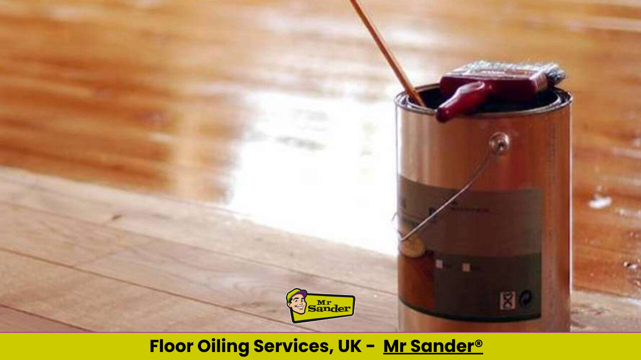 An open tin of wood oil with a brush resting on it, set beside a freshly oiled wooden floor as part of a Floor Sanding and Oil Finishes project.