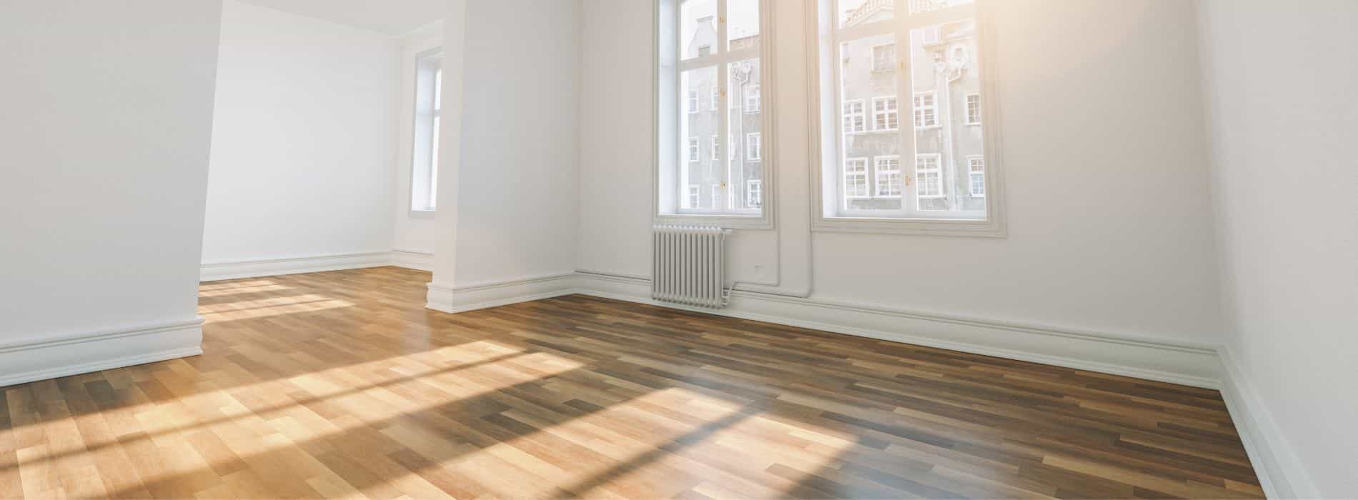 In Tottenham, N17, a hardwood floor has been masterfully restored through sanding, buffing, and whitewashing with Bona 2K Frost, then treated with two coats of Traffic HD 10% sheen matte lacquer, resulting in a stunning, long-lasting finish.