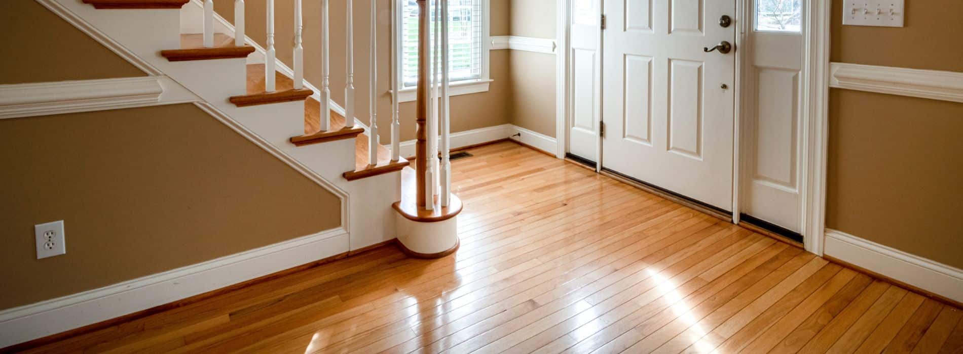A gleaming wooden floor is within reach, as a powerful polishing machine glides effortlessly across its surface, leaving behind a smooth, polished finish that shines with brilliance.