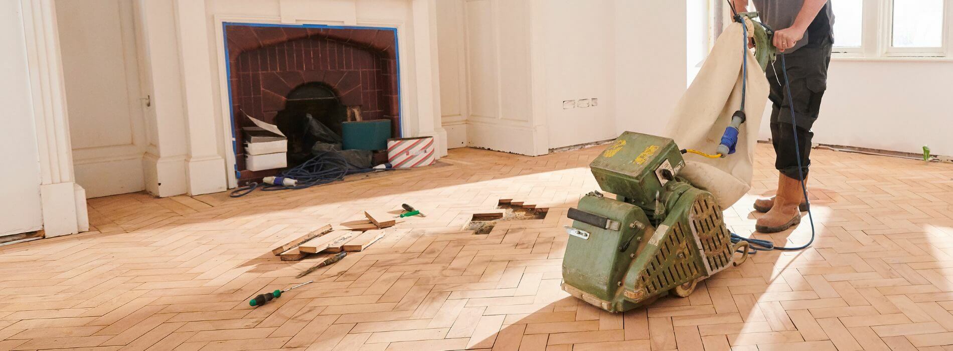 The Pros and Cons of Hand Sanding vs. Machine Sanding for Floors Mr