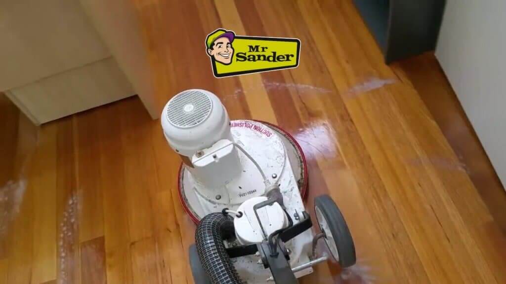 Close-up of a polishing machine restoring hardwood floors to a rich finish in Doune (FK16) by Mr Sander®️.