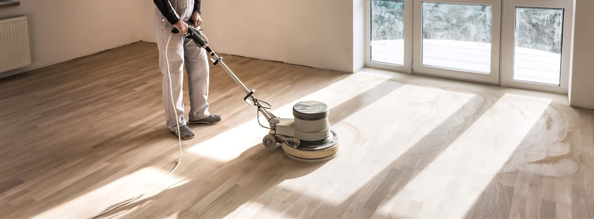 Mr Sander® sanding a floor with a Bona FlexiSand 1.9 sander, a powerful tool with a dimension of 407 mm and delivering an impressive 1.9 kW of effect. Operating at a voltage of 230 V and a frequency of 50 Hz/60 Hz, this versatile sander is equipped with various drive plates, catering to different tasks like bare wood sanding, fine sanding, oiling, and concrete grinding. To ensure cleanliness and efficiency, the sander is connected to a dust extraction system that incorporates a HEPA filter. This combination not only provides a thorough and professional sanding experience but also ensures a clean and healthy environment. With their expertise and state-of-the-art equipment, Mr Sander® deliver exceptional results for herringbone floor sanding projects.