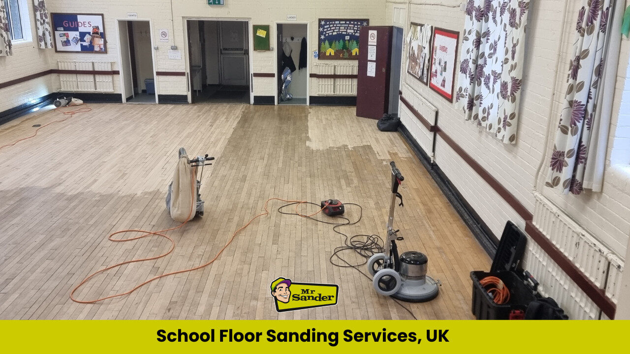 A partially sanded wooden floor in a UK school hall, showing floor sanding machines in use and emphasising the importance of Floor Sanding in Schools and Hospitals for hygiene and longevity.
