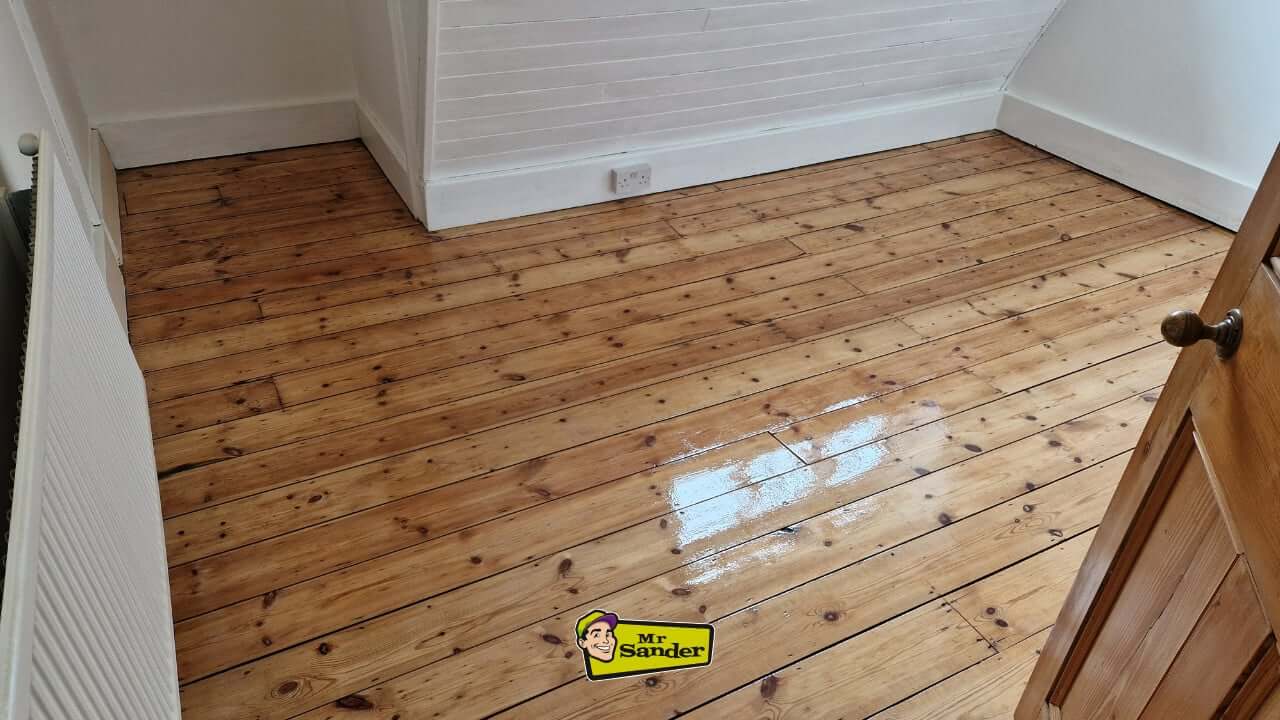 Beautifully restored wooden flooring in Hounslow West, showcasing a polished and natural finish after professional sanding and restoration.
