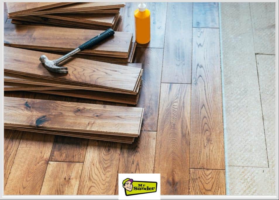 Solid wood floor fitting by Mr Sander®️ in Garthamlock G33, ensuring the timeless beauty of each plank.