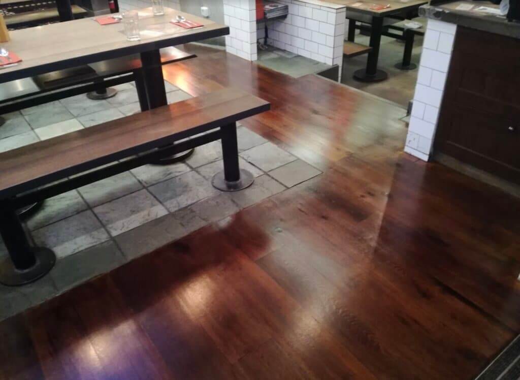 Restaurant hardwood floor at Wagamama in Central London, professionally sanded and sealed by Mr Sander®, showcasing a smooth and durable finish.