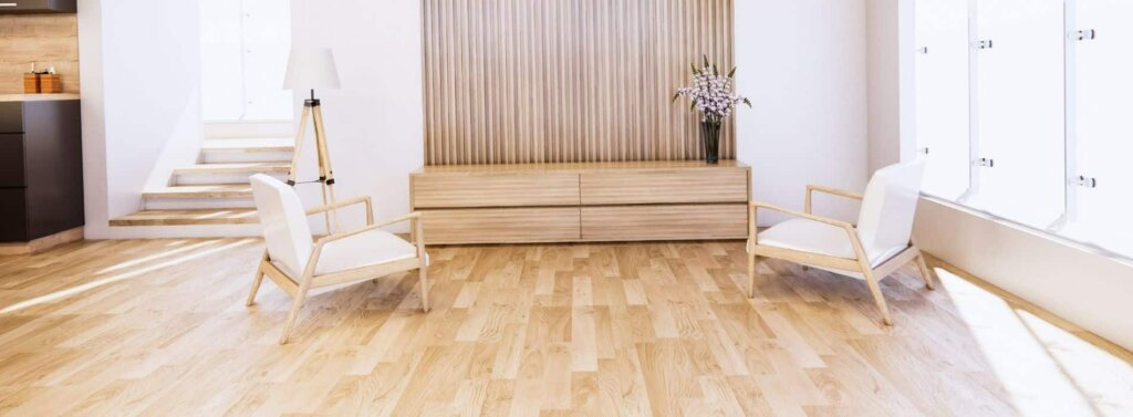 A modern living area in Farnborough, UK, featuring a beautifully sanded and refinished oak floor by Mr Sander®. The bright, spacious room highlights the high-quality finish achieved with advanced floor treatment techniques, enhancing the natural beauty and durability of the oak flooring.