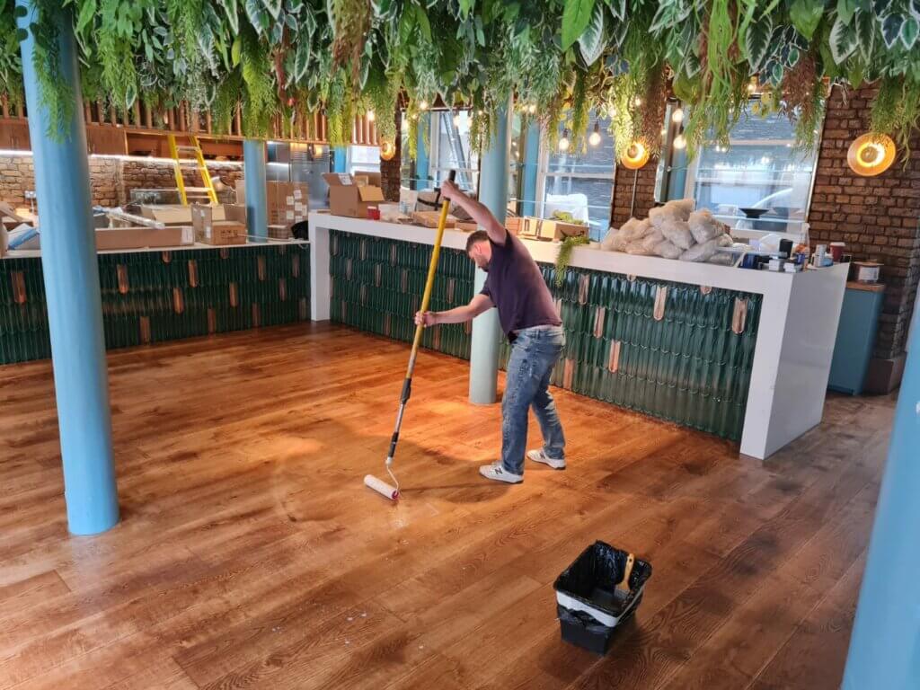 Transform Your Commercial Space: Expert Tips for Wood Floor Refinishing