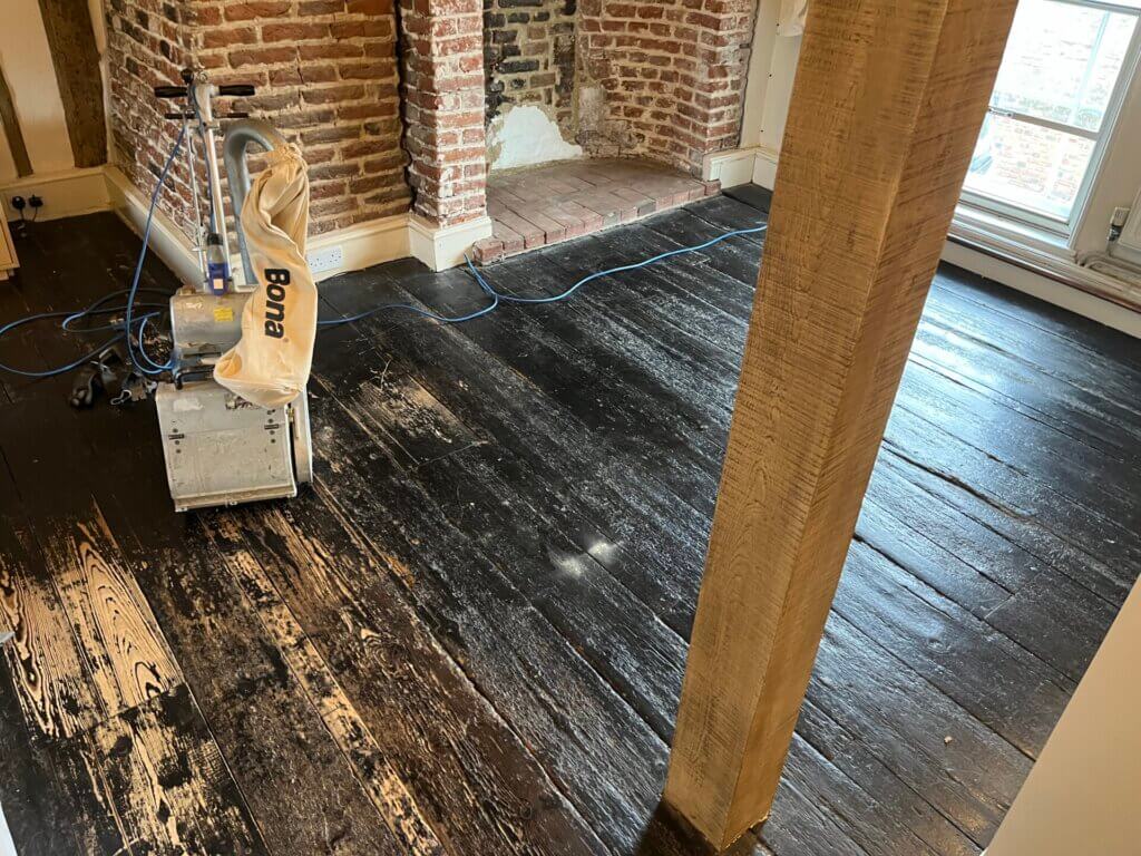 How do you tell if wood floors can be sanded?