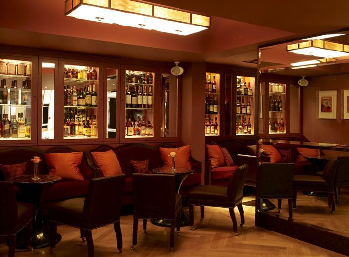 Hotel floor sanding project by Mr Sander in a London hotel, showcasing a glossy and impeccable wood finish