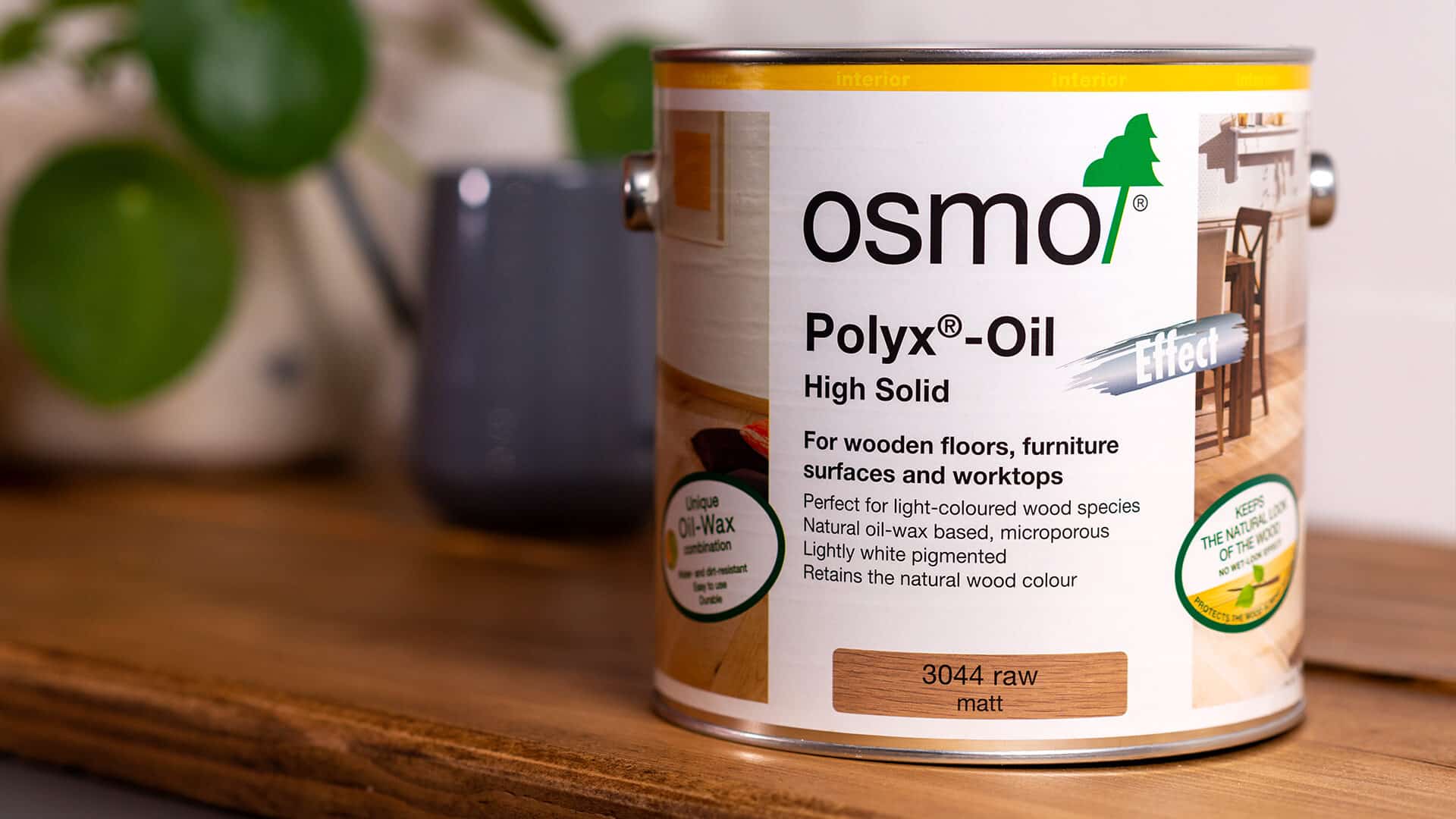 A can of Osmo Polyx-Oil High Solid in raw matt finish, suitable for wooden floors, furniture surfaces, and worktops. It features a natural oil-wax based, microporous formula that retains the natural wood color and is perfect for light-colored wood species.