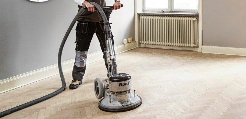Wood floor buffing to remove scratches and scuff marks, and to restore the natural shine and lustre of the wood.