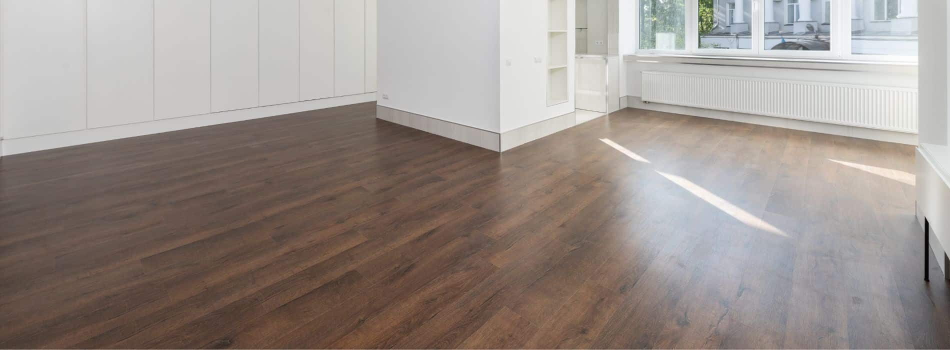 Expertly restored 5-year-old hardwood floor in Worcester Park, KT4. Bona 2.5K Frost whitewashing and Traffic HD 16% sheen matte lacquer were used by Mr Sander®. Durable and stunning, this finish ensures long-lasting beauty.