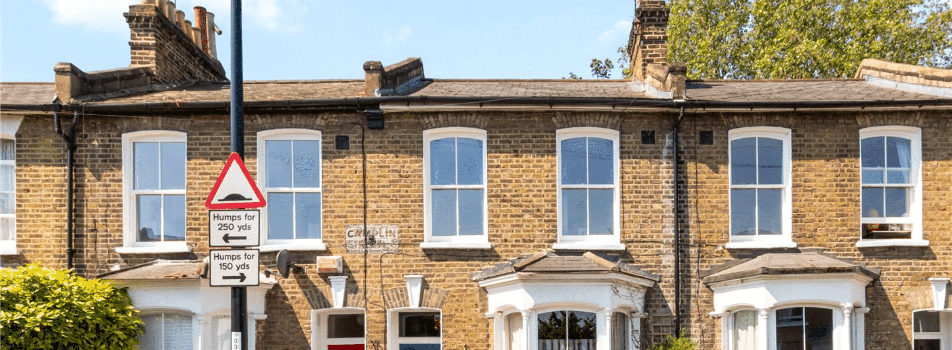 Vintage houses in New Cross Gate, SE14 showcasing original pine floorboards and unique architectural details, preserving the historical charm of the area.