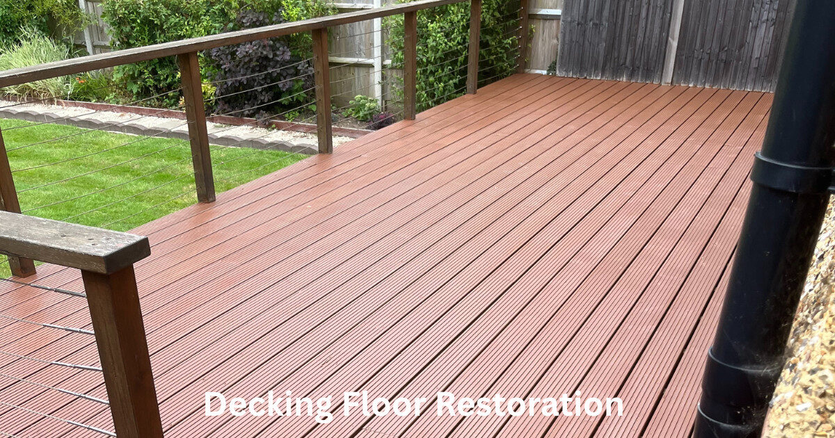 Restoring Floors in Decks: freshly sanded and oiled grooved timber decking on a garden terrace with cable balustrade, ready for use.