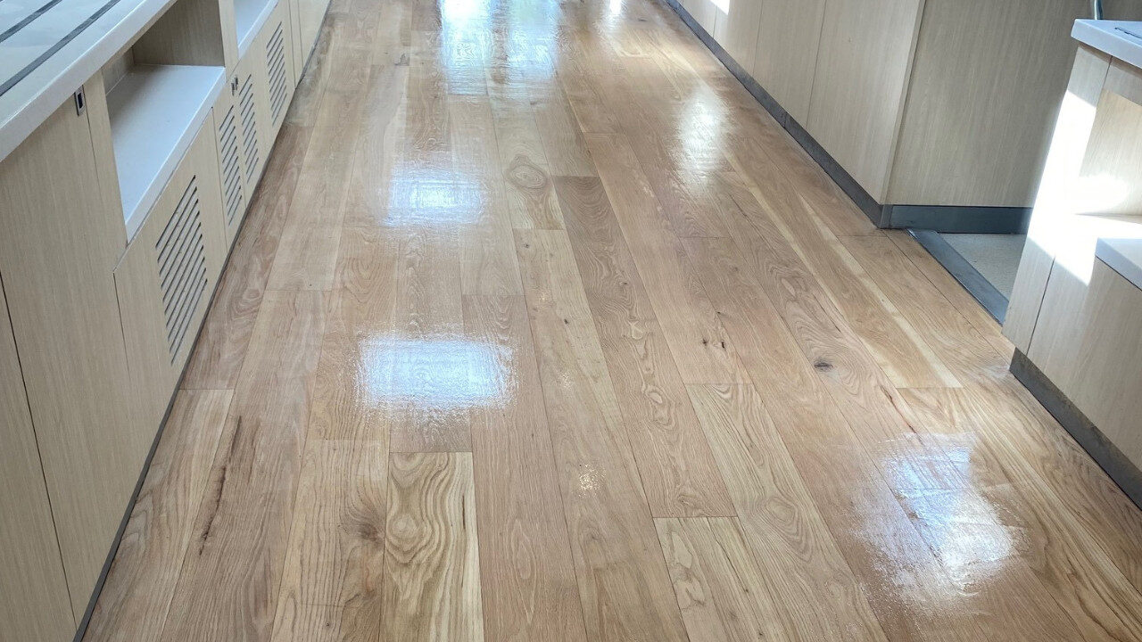School kitchen floor after restoration with low-VOC lacquer