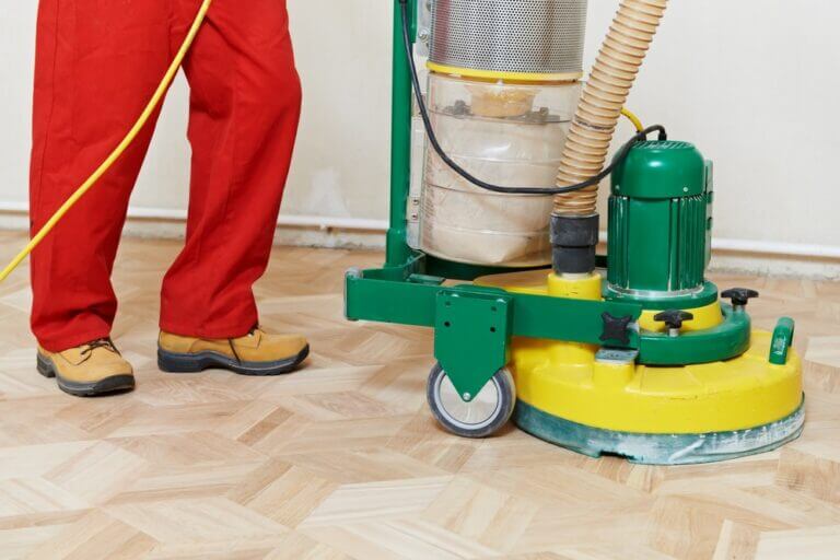 Parque floor restoration using triple disc sanding machine 120 grit final alioxide 200mm ceramic discs