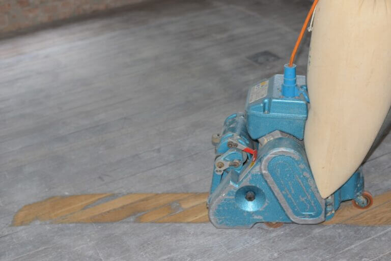 Sanding,Hardwood,Floor,With,The,Grinding,Machine.,Polishing,Old,Parquet