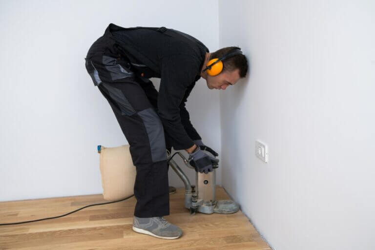 Mr Sander® in Rickmansworth, WD3, using a 2200 effect, 230 voltage, 50 frequency, and 200x750 mm Bona belt sander for meticulous herringbone floor restoration. Equipped with a HEPA filter dust extraction system for clean, dust-free results.