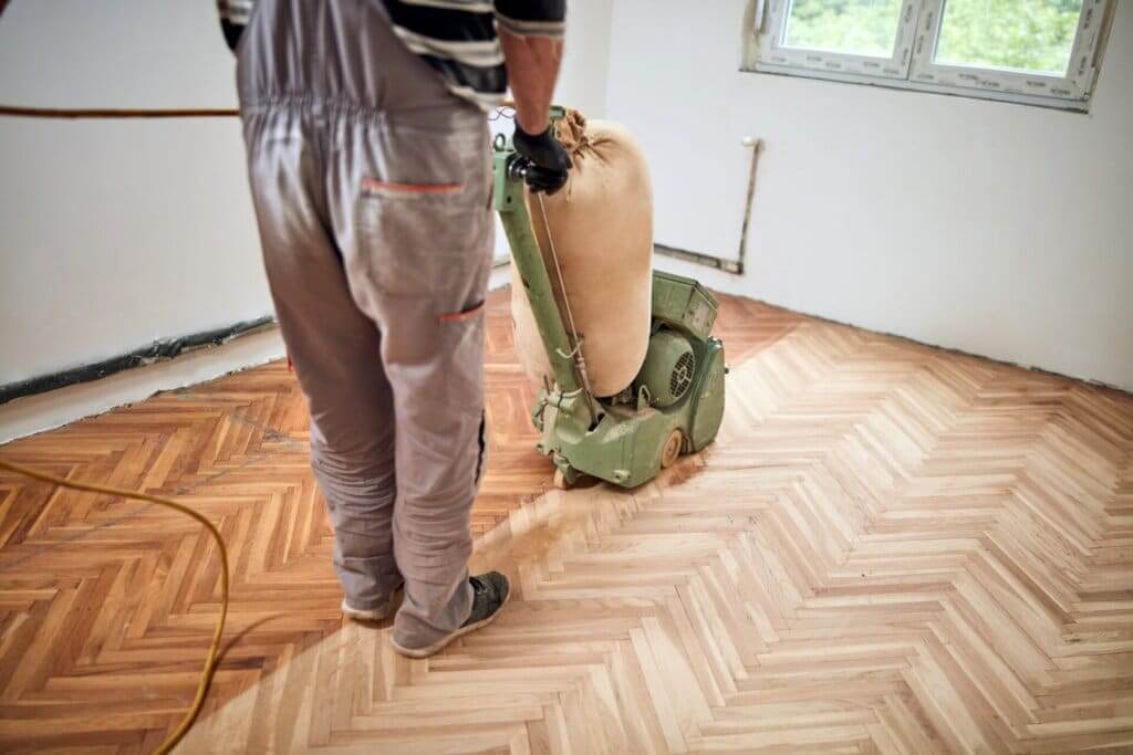 Is sanding wood floors expensive?