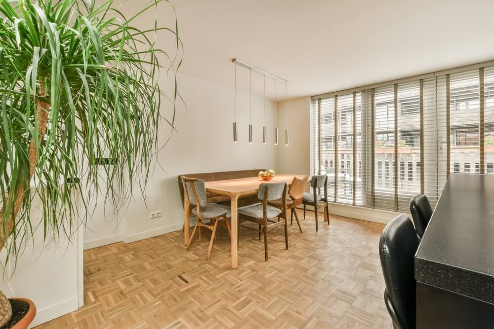 Dining room with parquet wooden floor in Finsbury Park, UK, showing the results of floor sanding and refinishing by Mr. Sander®.