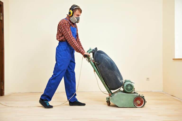 Carpenter,Doing,Parquet,Wood,Floor,Polishing,Maintenance,Work,By,Grinding