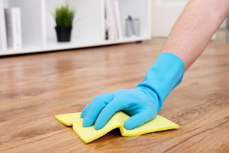 A,Hand,Cleaning,A,Parquet,Floor,With,A,Sponge