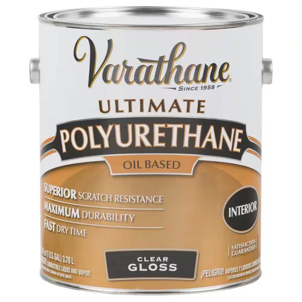 A can of Varathane Ultimate Polyurethane, oil-based, in a clear gloss finish. The label highlights its superior scratch resistance, maximum durability, and fast dry time, making it suitable for interior wood finishing projects.