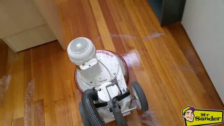 How do you keep dust down when sanding floors